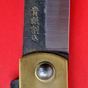 Close-up Japanese NAGAO HIGONOKAMI black folding pocket knife bluesteel brass 120mm Japan
